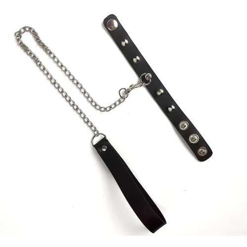 На фото зображено чорне кільце для пеніса з шипами та повідцем Penis Ring унісекс на білому тлі.