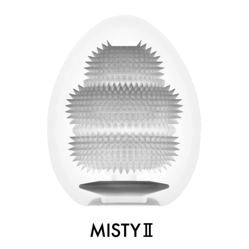 На цьому фото зображено біле яйце-мастурбатор Tenga Egg Misty II для чоловіків на світлому фоні.