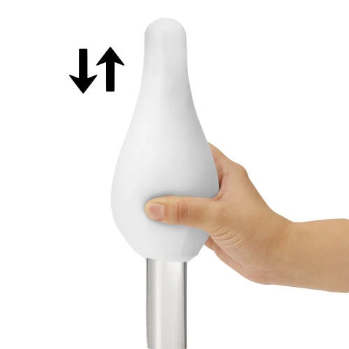 На фото зображено білий мастурбатор TENGA GEO Coral для чоловіків на світлому фоні.