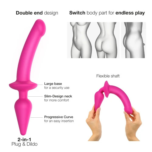На фото зображено рожевий фалоімітатор із анальним плагом Strap-On-Me SWITCH PLUG-IN SEMI-REALISTIC DILDO FUCHSIA - L на світлому фоні