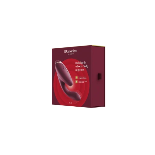 На фото изображен бордовый бесконтактный вибратор стимулятор Womanizer Duo 2 - Bordeaux для женщин на белом фоне.