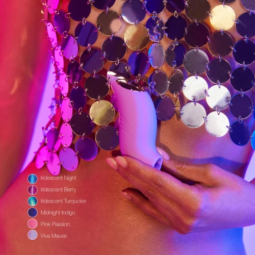 На фото зображено лавандовий вакуумний стимулятор із язичком Love To Love BELIEVER MAUVE для жінок на різнокольоровому тлі.