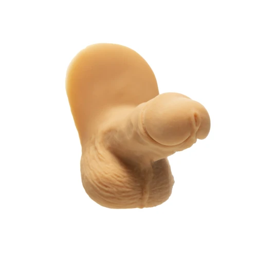 На фото зображений маленький тілесний фалоімітатор на присосці Addiction Packer Vanilla унісекс на білому тлі.