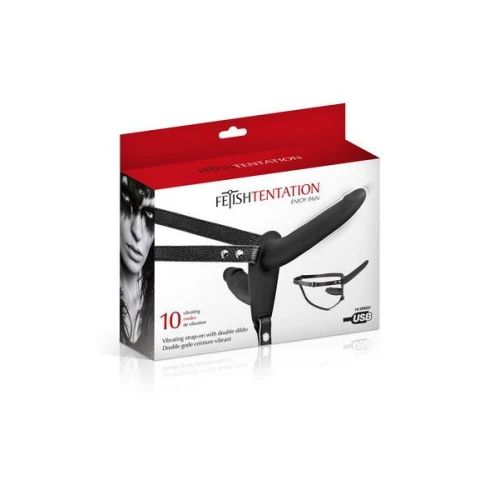 На фото зображено чорний подвійний страпон із вібрацією Fetish Tentation Vibrating Strap—On with Double Dildo Black для пар на білому тлі