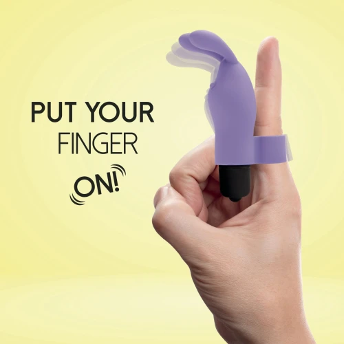 На фото изображен фиолетовый вибратор на палец с ушками FeelzToys Magic Finger Vibrator Purple для пар на желтом фоне