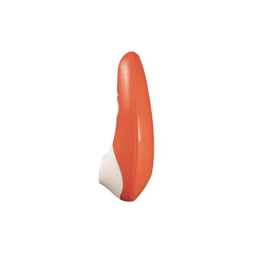 На фото зображено помаранчевий вакуумний стимулятор Romp Switch для жінок на білому тлі.