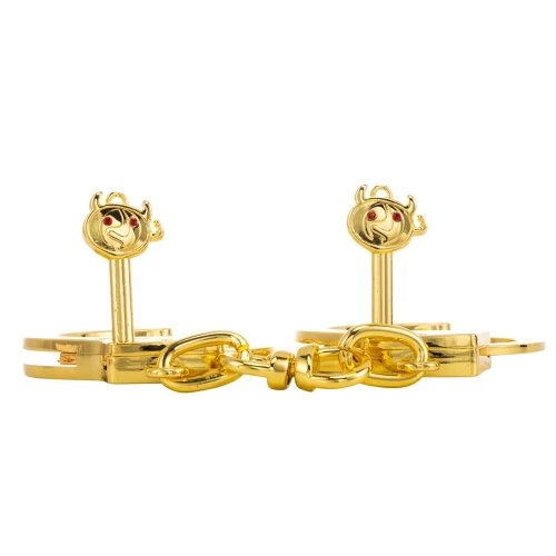 На фото изображены золотые наручники LOCKINK Pretty-sub Handcuffs на белом фоне 