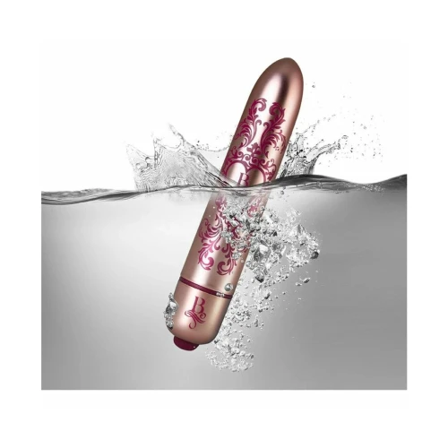 На фото изображена розовая недорогая вибропуля с узором  Rocks Off RO-90mm Promenade для женщин на белом фоне.