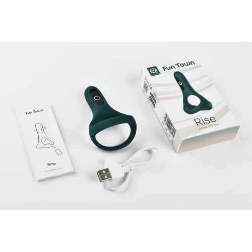 На фото изображено темно-синее двойное эрекционное кольцо Magic Motion Fun Town Rise Turquoise для мужчин на светлом фоне