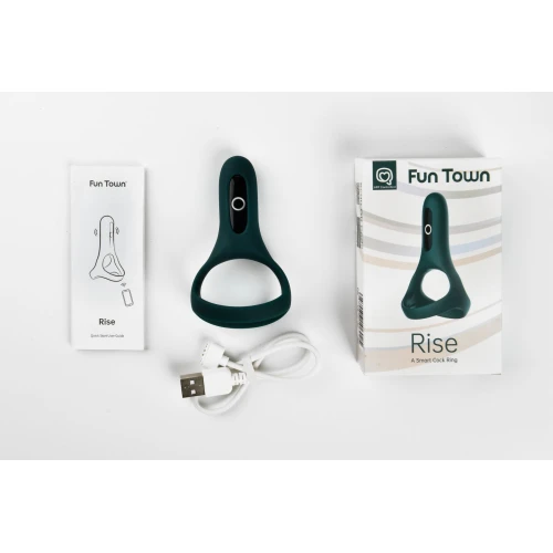 На фото изображено темно-синее двойное эрекционное кольцо Magic Motion Fun Town Rise Turquoise для мужчин на светлом фоне