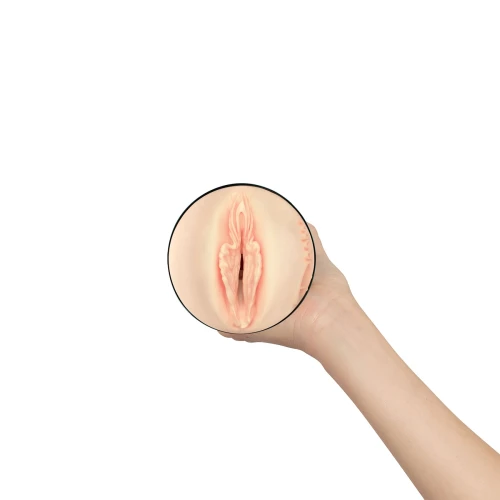 На фото зображено чорно-бежевий мастурбатор-вагіна Дафна Лаат Kiiroo Feel Daphne Laat для чоловіків на білому тлі.