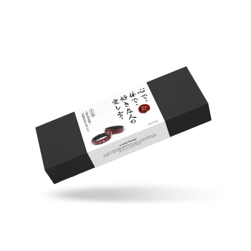 На фото изображены коричневые наручники Liebe Seele Wine Red Thigh Cuffs S унисекс на белом фоне 