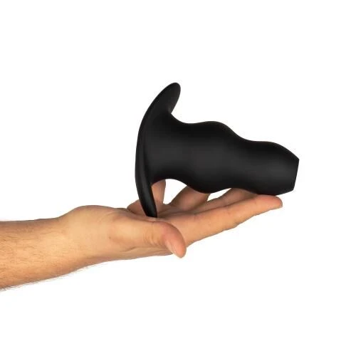 На фото изображена черная анальная пробка BUTTR - Foxhole Hollow Butt Plug унисекс на светлом фоне