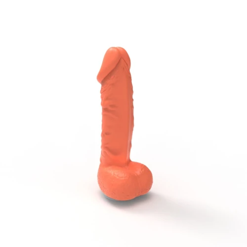 На фото зображено коралове крафтове мило-член із присоскою Pure Bliss MINI Coral унісекс на білому тлі.