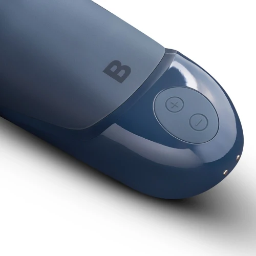 На фото изображен синий мастурбатор с вибрацией и всасыванием Boners Vibrating Blow Job Simulator для мужчин на белом фоне