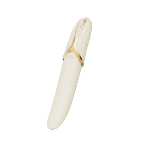 На даному фото зображений білий вібратор із елегантними золотими вставками.