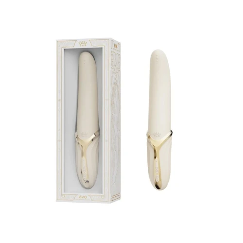 На даному фото білий вібратор з елегантними золотими вставками у білій коробці.