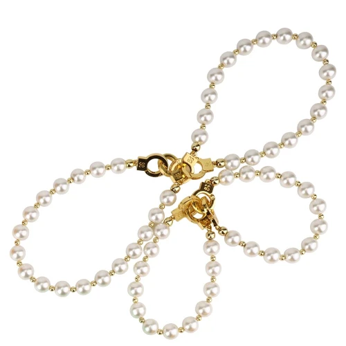 На фото зображені перлинні наручники та поножі LOCKINK Pearl Handcuffs & Anklecuffs на білому тлі