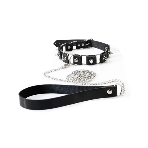 На фото зображено чорний бондажний набір: нашийник з повідцем, наручники та поножі Art of Sex - Cassandra унісекс на світлому тлі