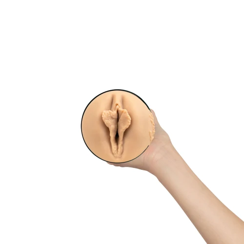 На фото мастурбатор Kiiroo Feel Agatha Vega PBC, сумісний з PowerBlow и Keon 