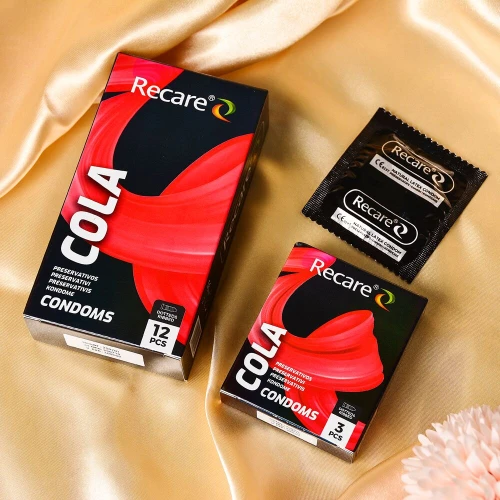 На фото презервативи Holographic Recare Cola Dotted&Ribbed Condoms 12шт, з пухирцями і ребрами, аромат: Кола 