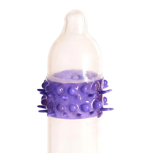 На фото насадка на член Recare Yellow Monster Spike Condom (презерватив з рядами пухирців та шипів) 