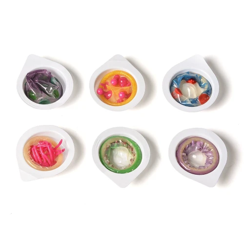 На фото насадка на член Recare Red Monster Spike Condom (презерватив с рядами шипов)