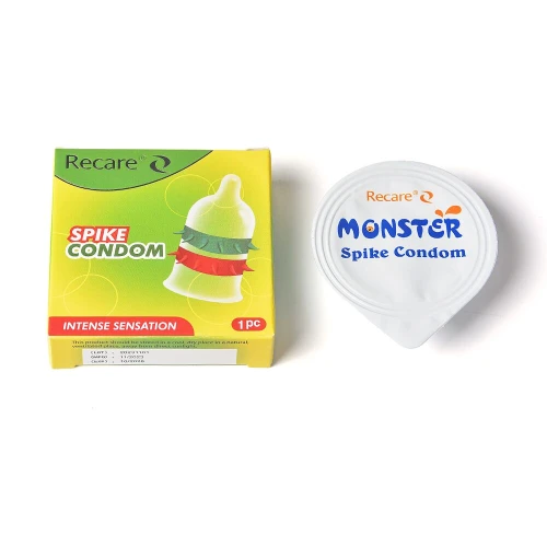 На фото насадка на член Recare Spike Condom Green (презерватив с рядами шипов)