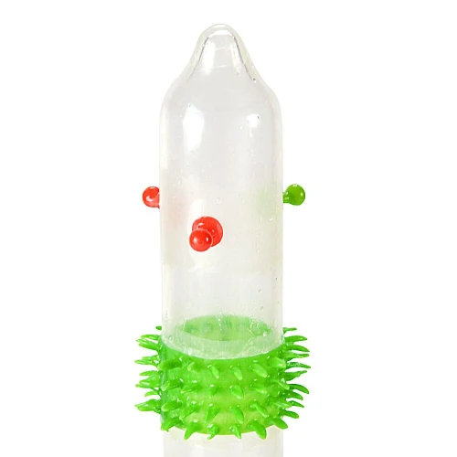 На фото насадка на член Recare Spike Condom Pink (презерватив з кульками та рядами шипів)  