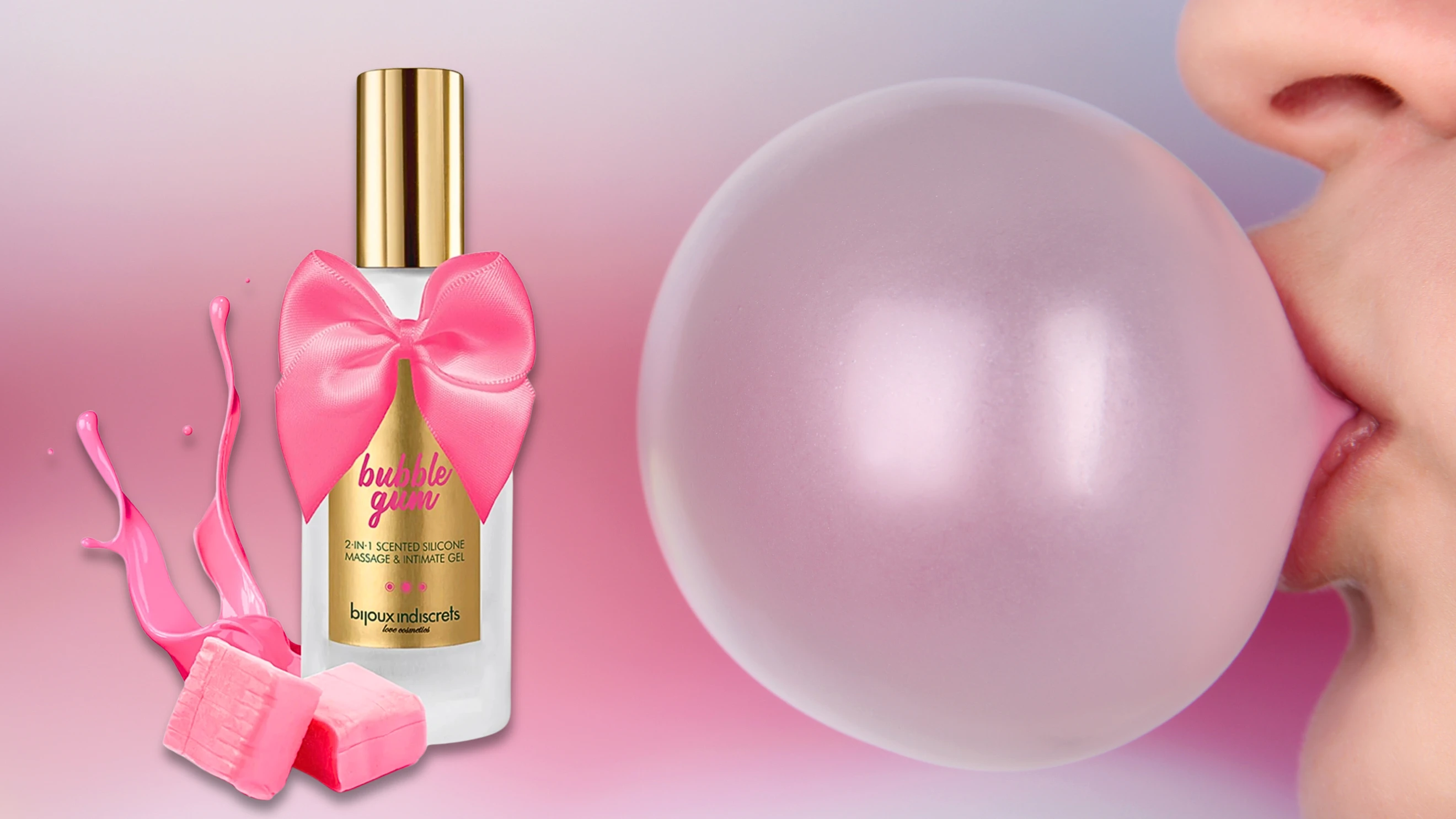 на фото зображений силіконовий лубрикант в красивому флаконі на фоні надутої жуйки