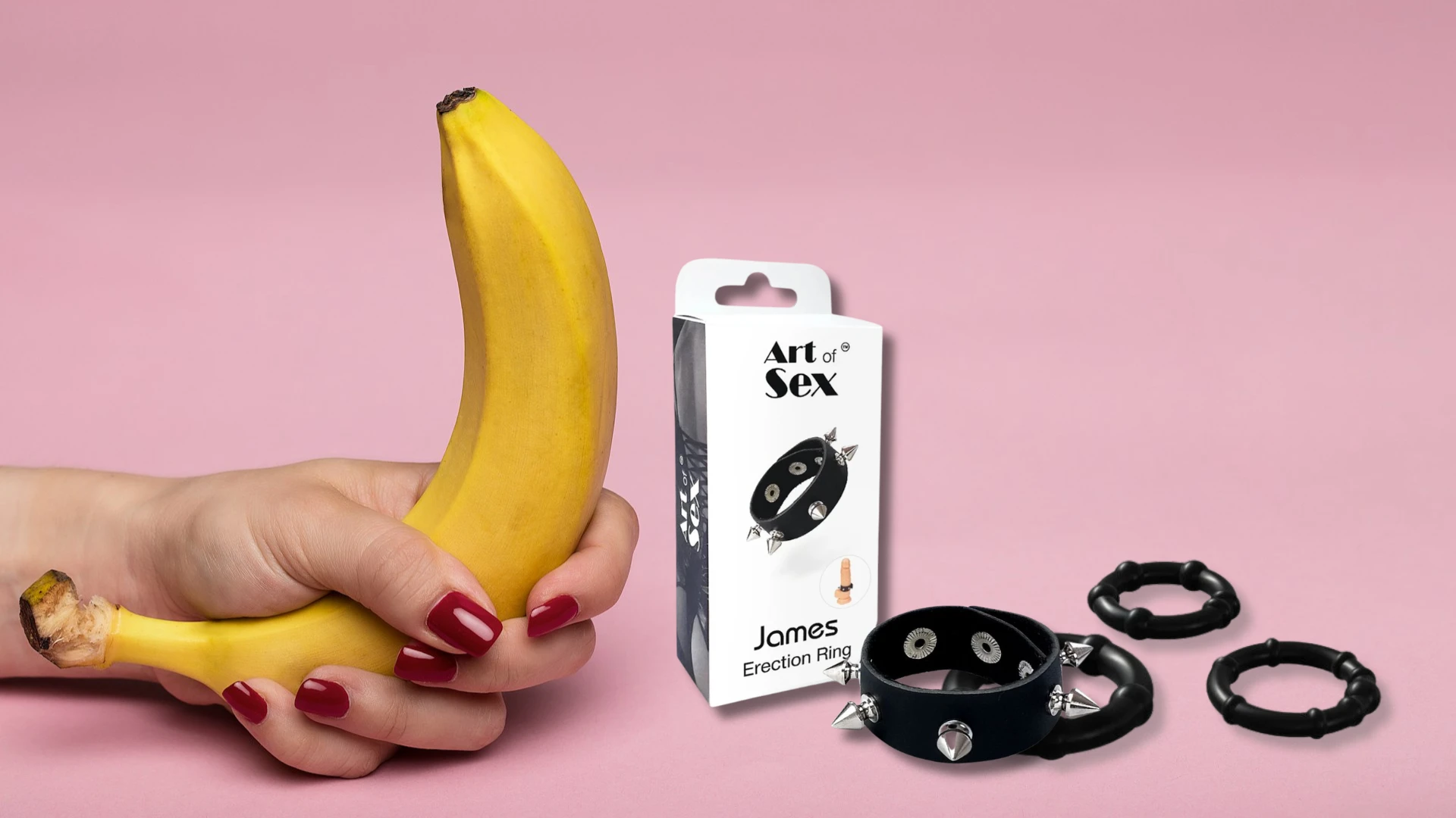 на фото изображены разные эрекционное кольца на член черные на розовом фоне и банан