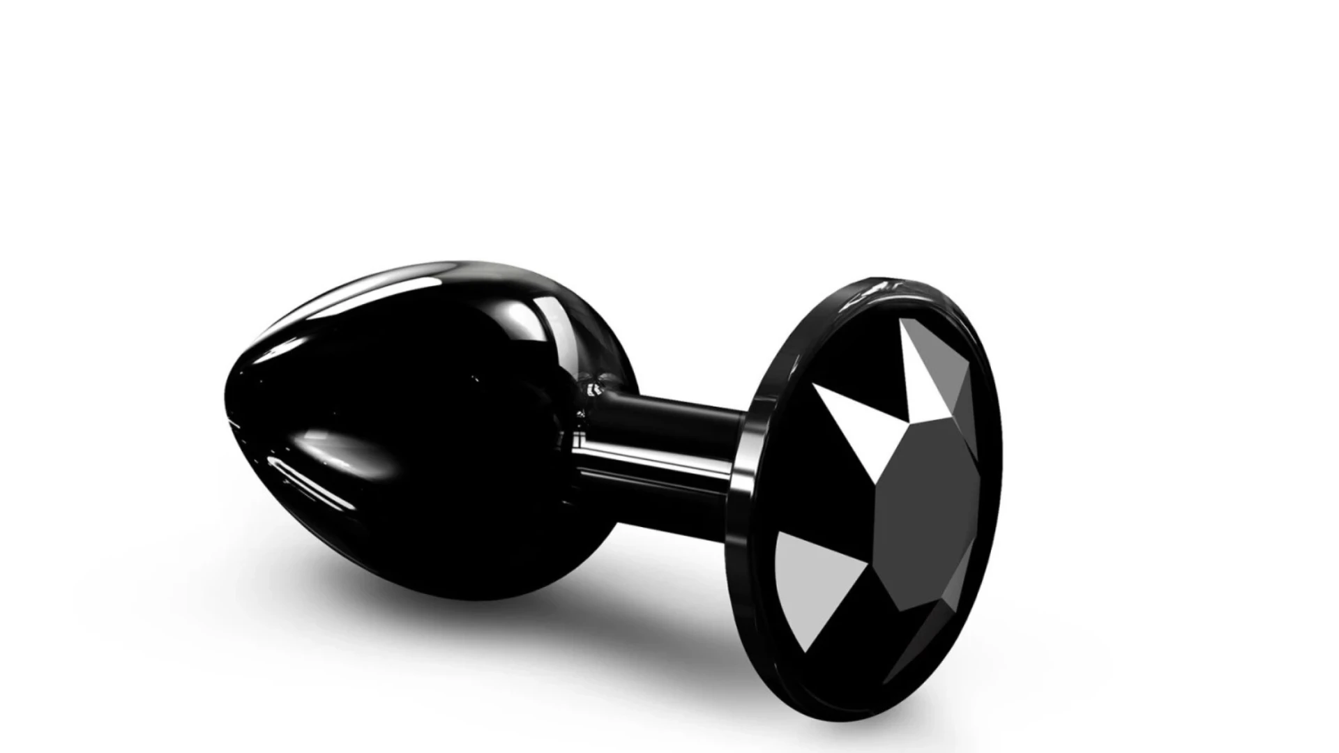 на білому фоні зображена чорна металева анальна пробка з каменем чорним