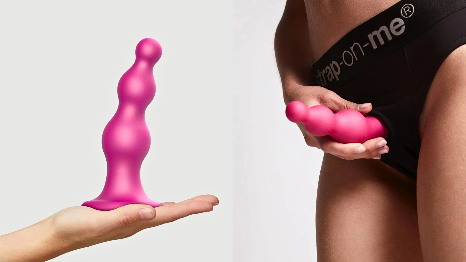 изображена розовая насадка фаллоимитатор для страпона в женской руке